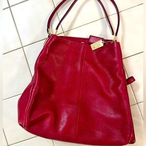 Beautiful red Coach purse hardly used.